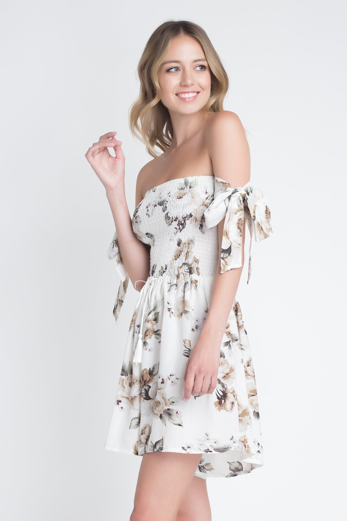 Garden Charm: Off-Shoulder Smocked Floral Tie Romper
